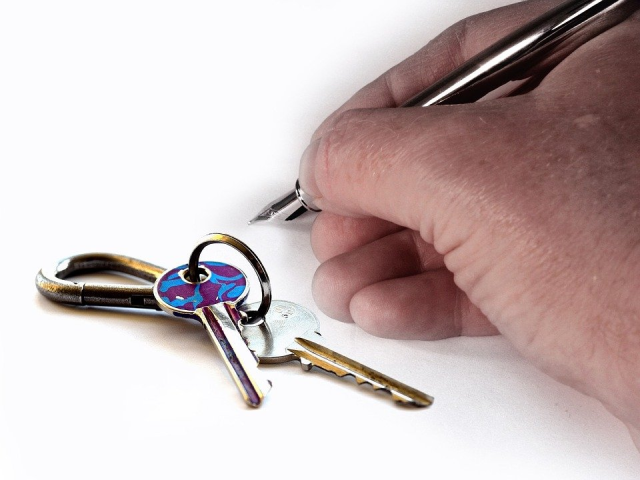 a person signing a document